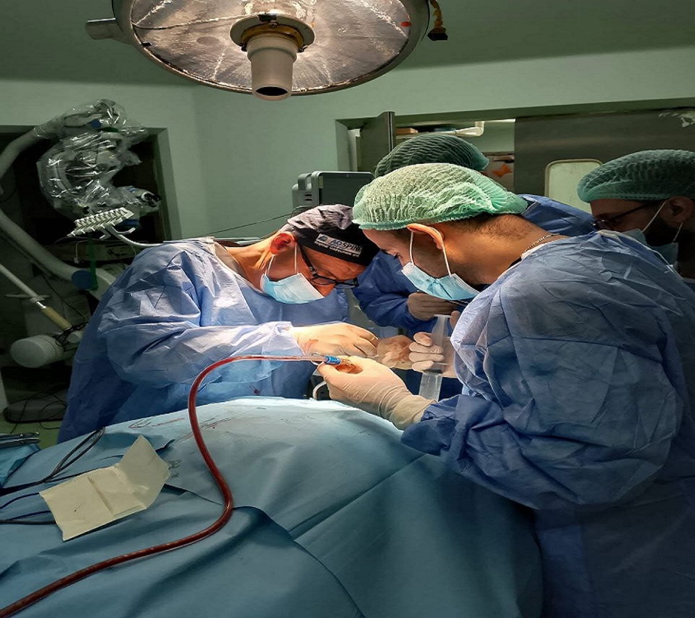 The removal of a bleeding tumor for a patient suffering from a brain tumor.