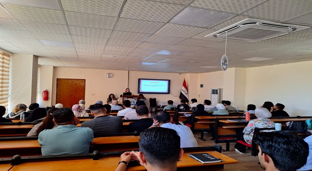 Presentation of the seminar on hypertension in children in the Pediatrics Department at Al-Nahrain College of Medicine.